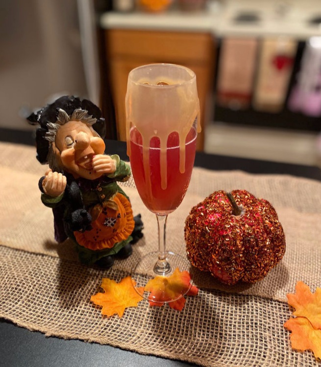 Image of mimosa and witch figure